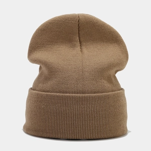 Detailed close-up of brown knit beanie showing fine texture and wide fold-over cuff