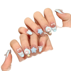 Pastel blue gradient handmade press-on nails with 3D star and bowknot charms