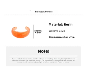 Detail view showing orange resin bangle specifications: 27.2g weight and 6.5x7cm size