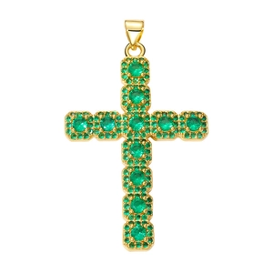Close-up of golden cross pendant featuring multi-set round green gemstones on white background