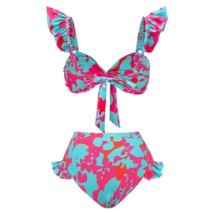 Detail of ruffled shoulder straps and high-waisted bikini bottom with abstract print