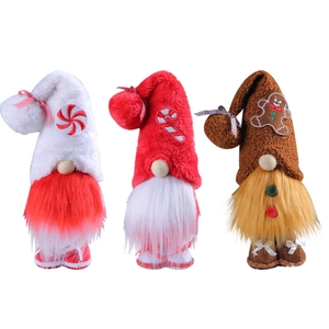 Three Christmas faceless gnomes with candy motifs and gingerbread decor on white background