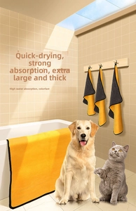 Thick yellow microfiber quick-dry towel for large dogs and cats on bathtub