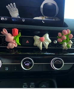Detail of pink bunny with tulip car vent clips and bow diffuser decoration set