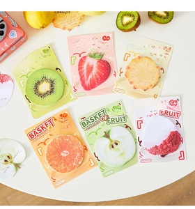 Macro detail of 6 creative fruit-shaped sticky notes with realistic textures and packaging