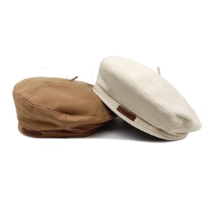Vintage brown and cream wool beret hats with handmade leather label for women