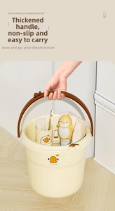 Detail of reinforced handle on portable plastic wash basket with cartoon duck rinsing cup