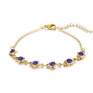 Bracelet élégant en acier doré orné de six zircons bleus scintillants en forme d'étoile