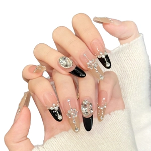 Luxury long almond press-on nails with black pink rhinestone gems and chain accents