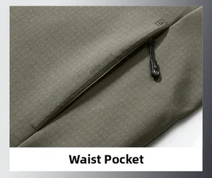 Close-up of wrinkle-resistant jacket waist pocket with textured fabric and logo puller