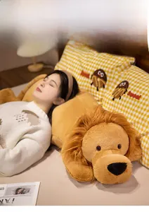 Long soft plush lion pillow in rabbit fur texture used as a comfy sleeping cushion