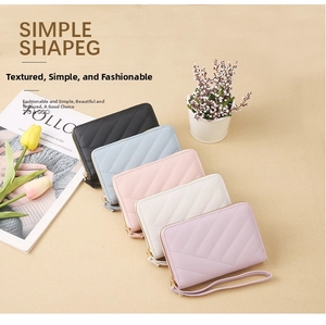 Short quilted PU leather wallets in various pastel colors with gold zippers and wristlets