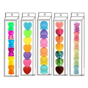 Set of 5 colorful resin hair clips featuring bears, hearts, and octopus shapes in boxes