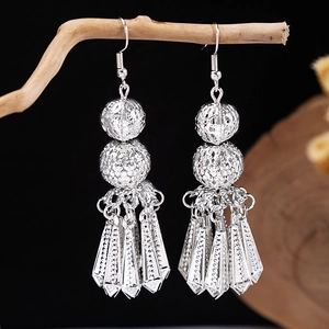 Vintage silver tassel earrings with hollow floral metal balls and bohemian ethnic fringe