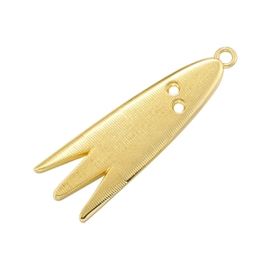 Macro detail of golden fork-shaped metal pendant with brushed texture and top ring