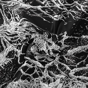 Macro shot of boho skeleton tapestry showing high-quality black and white fabric print detail