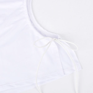 Detail of white mesh dress featuring elegant side lace-up drawstring and fine stitching