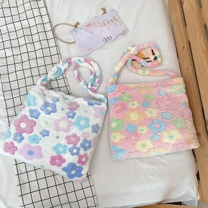 Cute plush floral tote bag with soft furry texture and crossbody strap for women