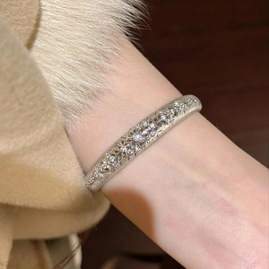 French retro hollow flower cuff bracelet in matte silver with sparkling zircons