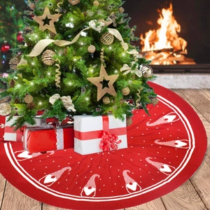 Red knitted Christmas tree skirt featuring white gnome patterns and festive decor