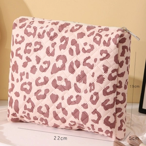Pink leopard print quilted makeup bag for women, size 22cm x 19cm with zipper closure