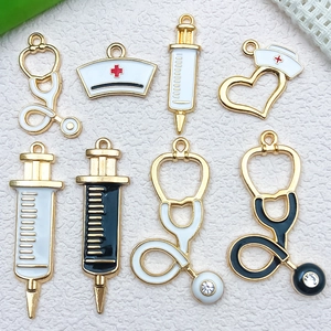 Set of 8 medical-themed enamel charms including stethoscope, syringe, and nurse hat for DIY