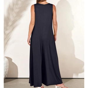Detailed back view of a sleeveless summer jumpsuit showing elegant drape and tailored cut