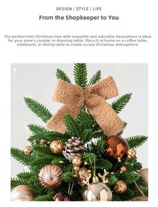 Detail of mini Christmas tree with teddy fleece bow, pine cone, and golden reindeer head
