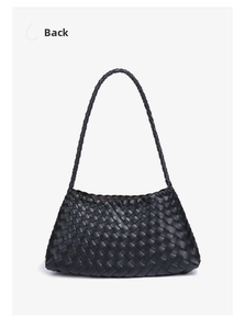 Back view showing intricate hand-woven texture of black leather tote bag