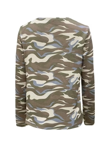 Detail of waffle knit fabric texture and camouflage print on the long sleeve top