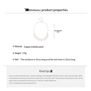 Detail view of pearl pendant necklace with dimensions 41cm plus 13cm extension chain
