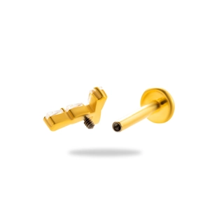 Gold G23 titanium labret stud with three sparkling zircon stones and flat back design