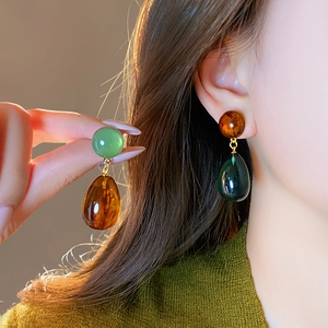 Asymmetric resin waterdrop earrings with vintage amber and jade textures for women