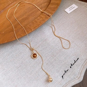 Coffee resin heart pendant necklace with vintage gold chain and polished sphere charm