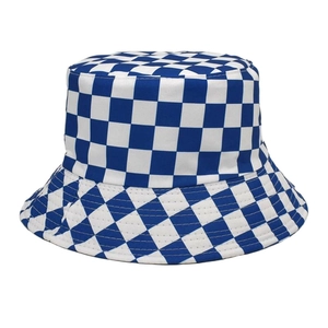Close-up of blue and white checkerboard pattern on cotton canvas sun bucket hat fabric