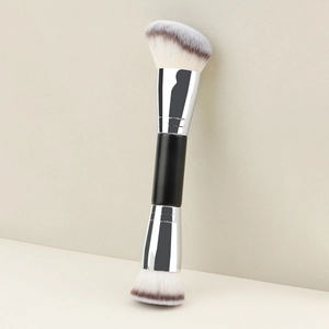 Professional dual-ended makeup brush with black handle and angled synthetic bristles