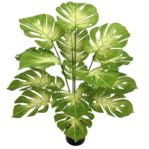 Artificial monstera deliciosa plant in a minimalist black pot for home decor
