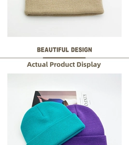 Detail of multi-color knitted beanies in khaki, blue, and purple with fine ribbed texture