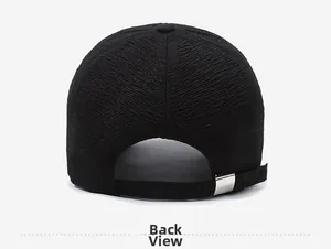 Detail view of the black baseball cap back with ripple fabric and metal buckle