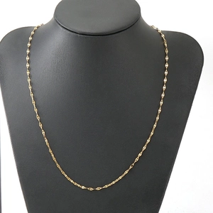 18K gold plated stainless steel lip chain necklace displayed on a black mannequin bust