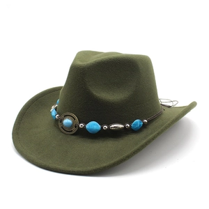 Detail of dark green wool felt cowboy hat with bohemian turquoise bead band and buckle