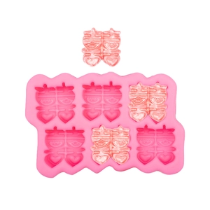 6-cavity pink silicone mold featuring traditional Chinese Double Happiness Xi wedding design