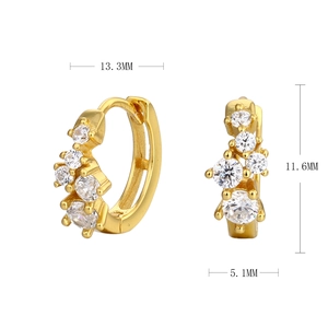 Macro shot of gold S925 silver hoop earrings with clear zircon stones showing dimensions