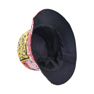 Colorful paisley patchwork reversible bucket hat with yellow red and orange blocks