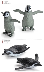 Macro detail of realistic penguin chick and swimming penguin animal model figures