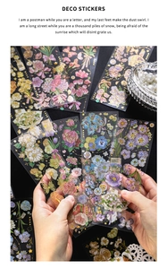 Detailed view of floral PET stickers with gold foil accents for scrapbooking and decoration
