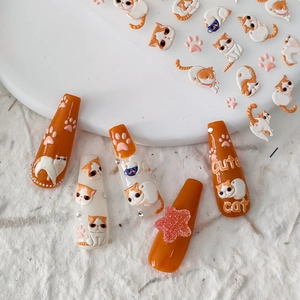 5D embossed nail art stickers featuring cute orange cats and 3D textured paw prints