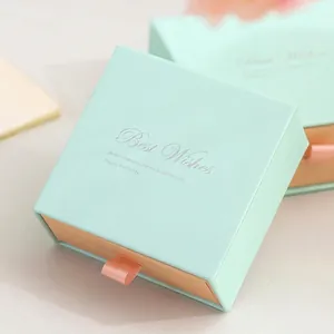 Mint green drawer jewelry gift box with pink ribbon handle and Best Wishes slogan