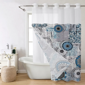Detail of bohemian floral print shower curtain with silver metal rings and waterproof fabric