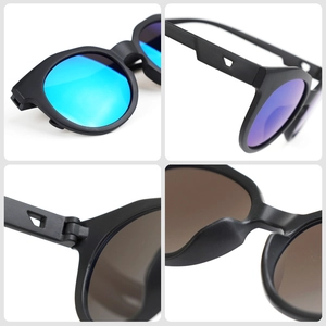 Kids candy-colored matte black round sunglasses with colorful UV400 reflective lenses